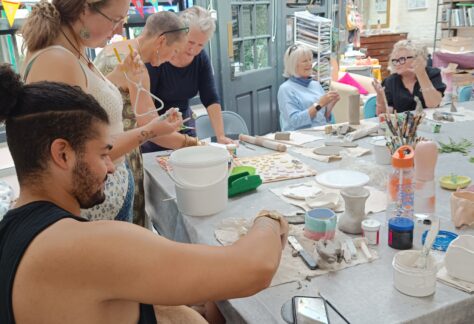 People having fun at a pottery workshop